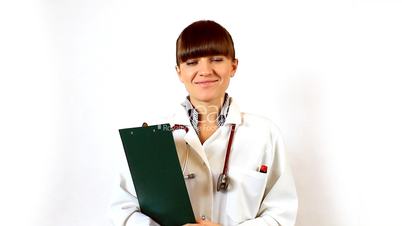 Young female doctor hold notepad and smiles