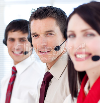 Customer service agents with headsets on