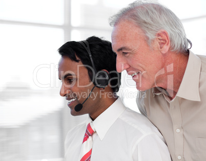 Senior businessman checking work