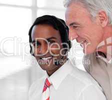 Multi-ethnic customer service agents working together