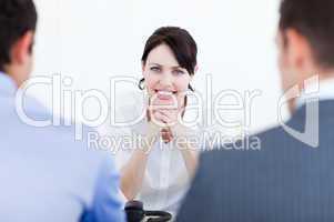 Attractive female executive at a meeting