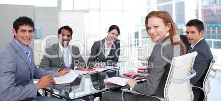 Business group showing ethnic diversity smiling at the camera
