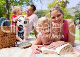 Happy young family enjoying a picnic