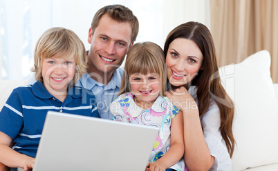 Young family surfing the internet