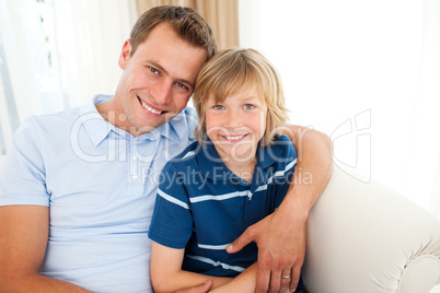 Portrait of an attractive father hugging his son