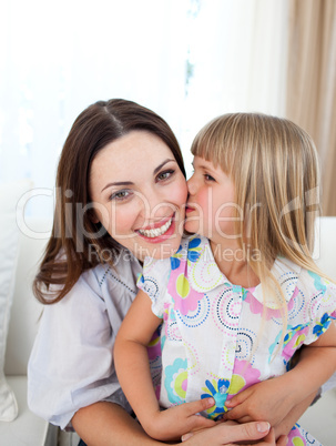 Cute girl kissing her mother