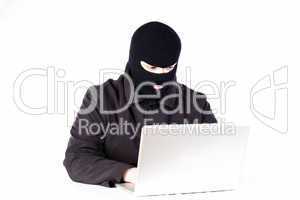 Man stealing data from a laptop