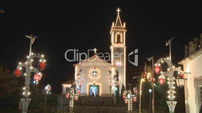 Church decorated with Christmas lamps