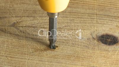 Unscrewing screw in wood