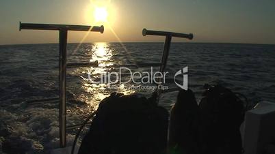 Dive boat ladders and sunrise