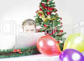 Young lady Christmas shopping online