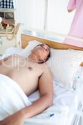 patient lying on a hospital bed
