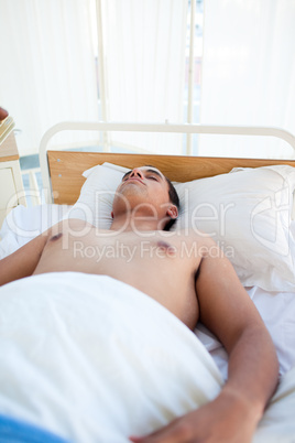 patient lying on a hospital bed