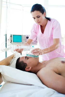 Male patient receiving oxygen mask