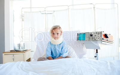 girl sitting on a hospital bed