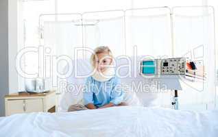 girl sitting on a hospital bed