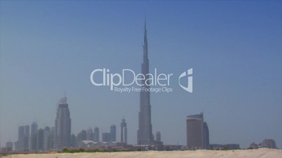Dubai skyline pan burj emirates dune