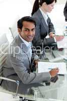 businessman sitting at a conference table