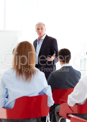 businessman giving a conference