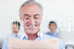 manager reading at his desk