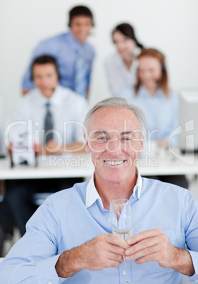 manager with glass of Champagne