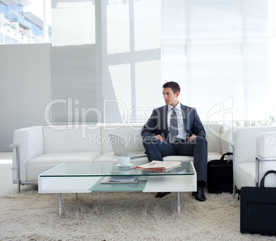 Businessman sitting in a waiting room