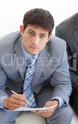 Businessman writing