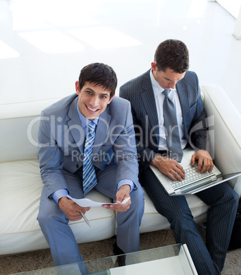 Businessmen waiting for a job interview