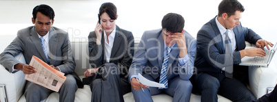 business people in a waiting room