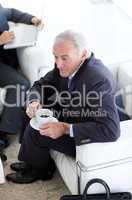 Businessman drinking coffee