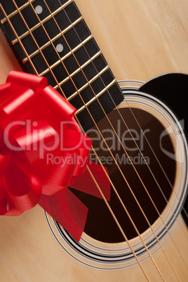 Guitar Strings with Red Ribbon