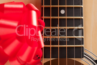 Guitar Strings with Red Ribbon