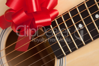 Guitar Strings with Red Ribbon