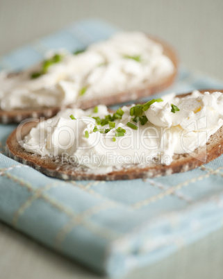 Cream cheese and chives on bread