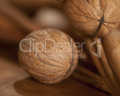 Cinnamon sticks and walnuts