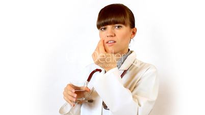 Young Female Doctor taking pill