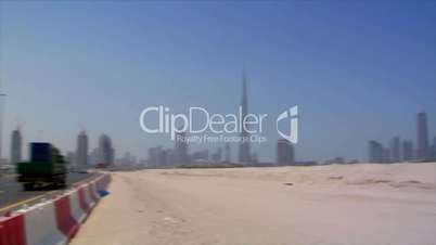 Dubai skyline pan burj emirates traffic