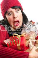 Excited Woman Balancing Holiday Gifts