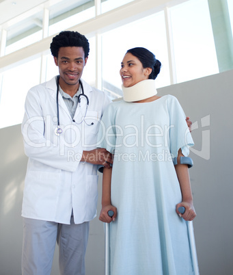 A doctor helping a patient