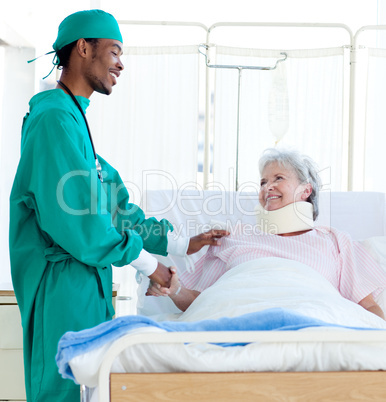 A surgeon caring for a patient