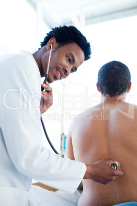 doctor checking patient