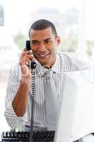 Attractive businessman on phone