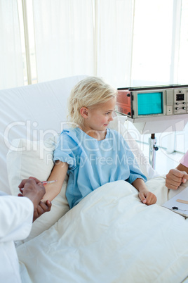 Little girl receiving an injection