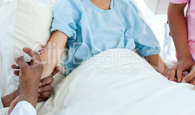 child patient receiving an injection