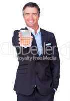 businessman holding a calculator