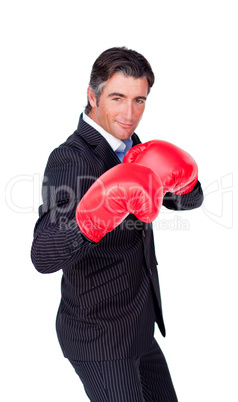 businessman wearing boxing gloves