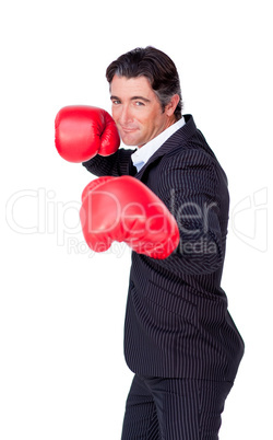 businessman wearing boxing gloves
