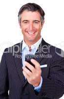 Happy businessman with phone