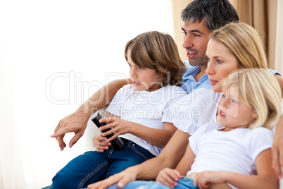 Young Family watching TV