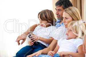 Young Family watching TV